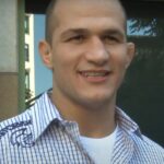 Shoulder Surgery Looms: Dos Santos Reveals Plan for Combat Comeback