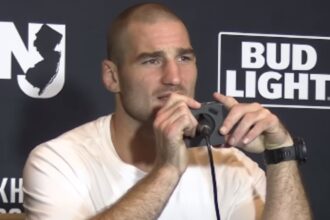 Strickland’s Title Quest Sparks Debate: Is Whittaker the Real Contender?